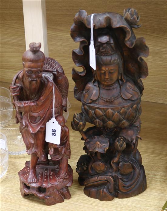 A Chinese hardwood group of Guanyin and a group of fishermen